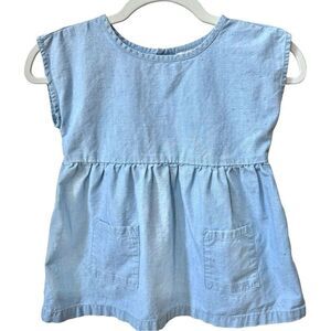 Hanna Andersson Girls Short Sleeve Chambray Flecked Button Back Top. 6-7. 6. 7.